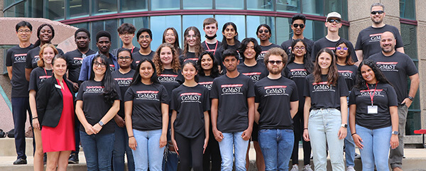 Illinois Summer Research Academy students, mentors, and staff posing in their CeMaST t-shirts.